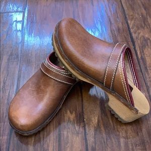 Brown leather clogs
